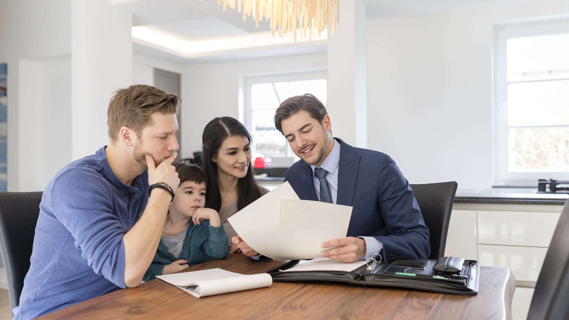 Family meeting with advisor over paperwork