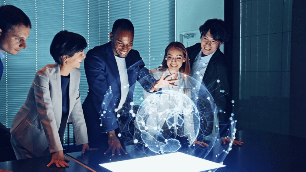 Business team examining holographic globe projection