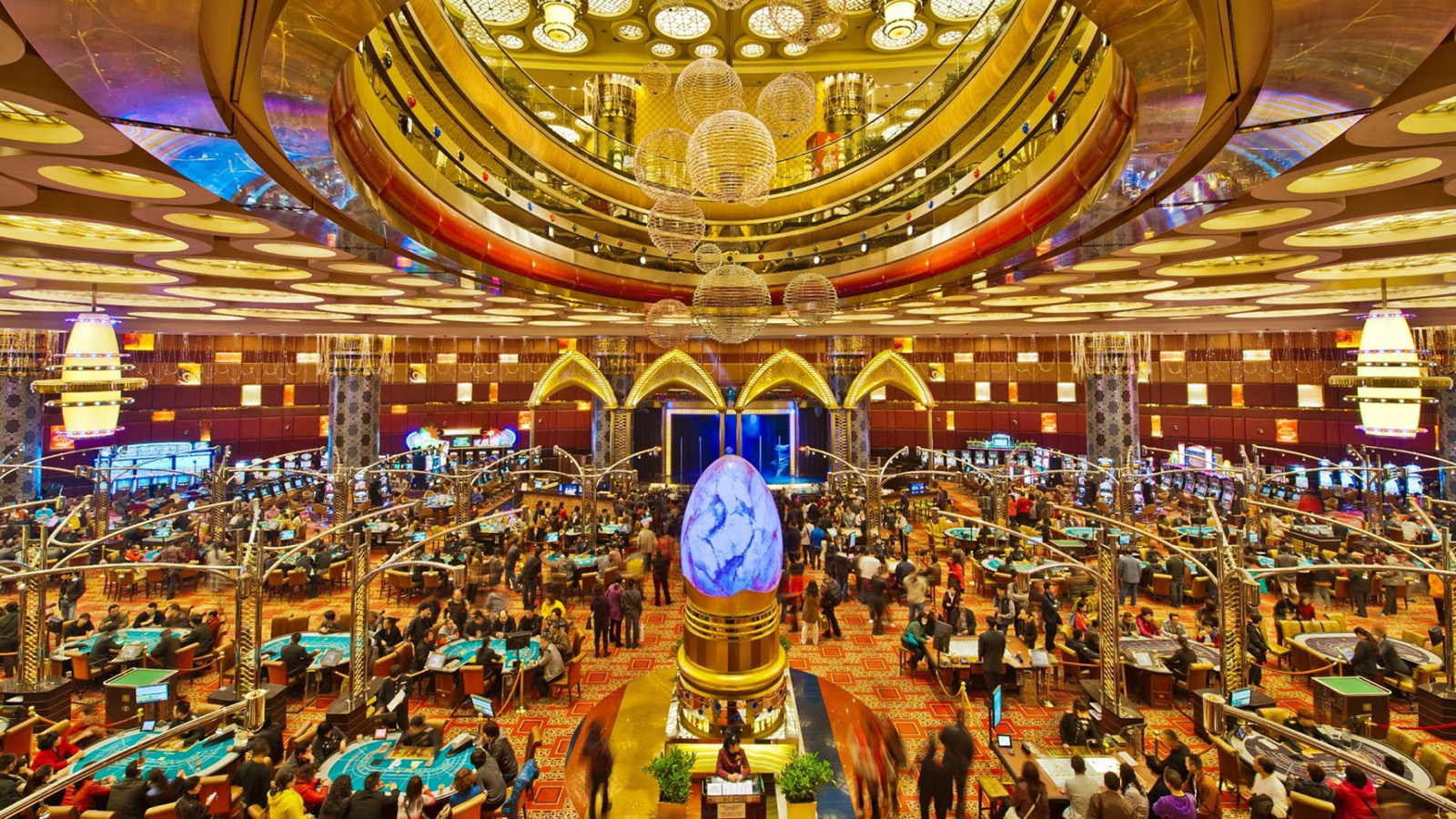Ornate casino interior with glowing centerpiece sculpture