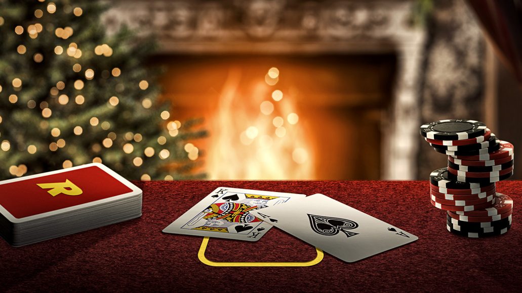 Poker hand with chips by cozy fireplace