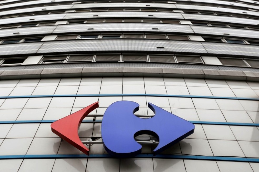 Carrefour logo on tiled building facade