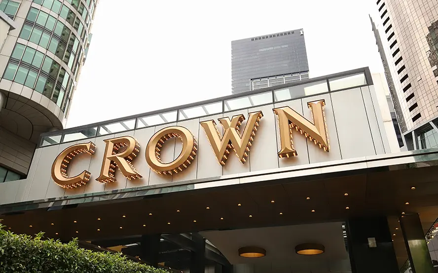 Gold CROWN sign above hotel entrance