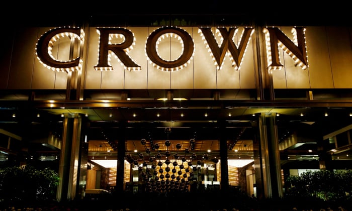 Illuminated Crown hotel and casino entrance sign