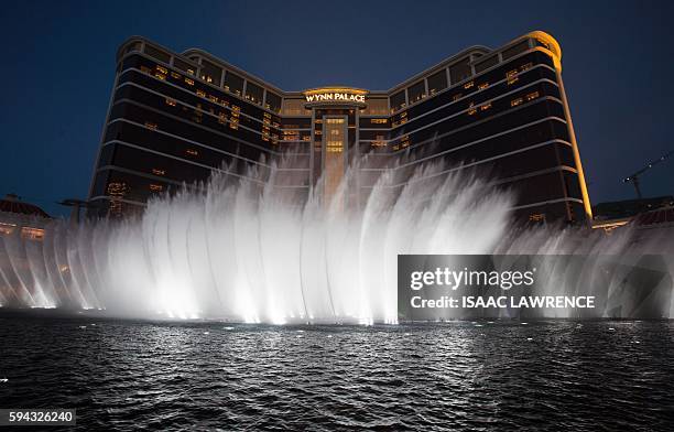Illuminated Wynn Palace fountain show at night