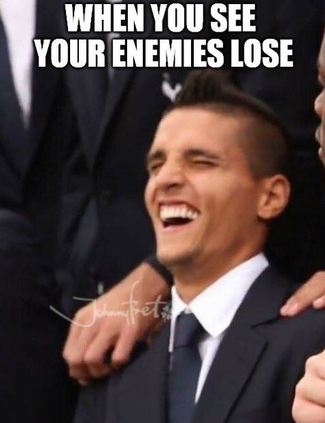 Laughing man in suit meme