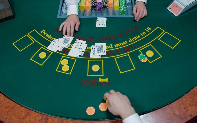 Casino blackjack table with cards and chips