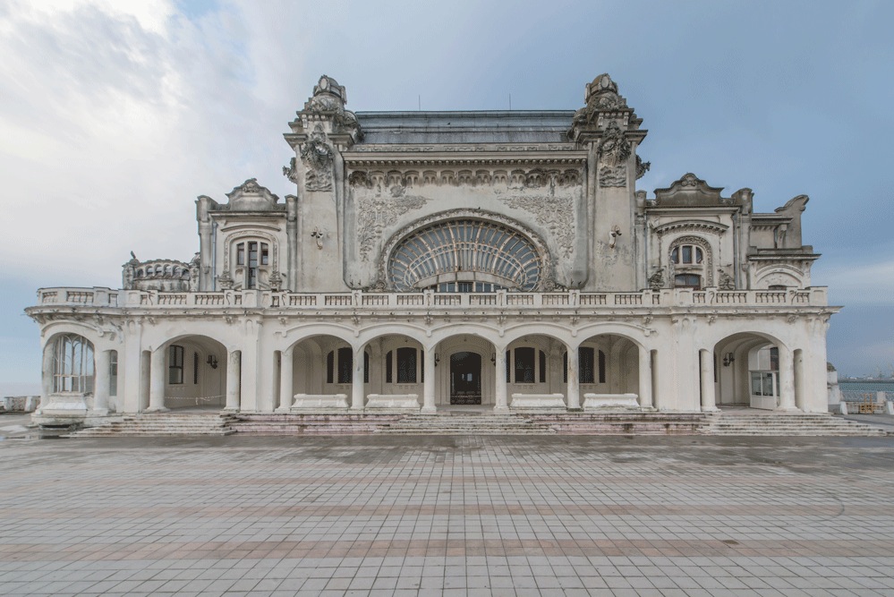 ornate abandoned seaside casino facade