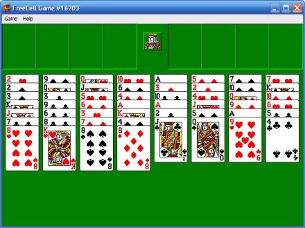 FreeCell solitaire game screenshot on green background