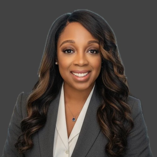 Smiling professional woman portrait in gray suit