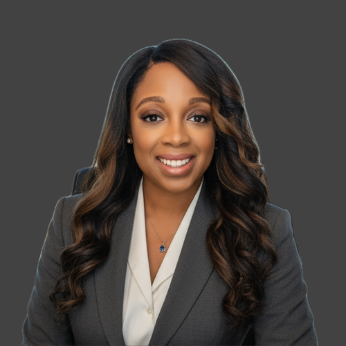 Smiling business professional headshot in gray suit